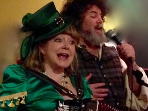 Jennifer Cutting and Steve Winick leading a Washington Revels Pub Sing
