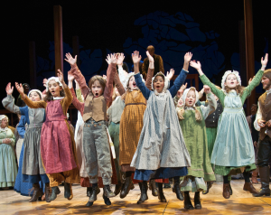 Children jumping in the Christmas Revels