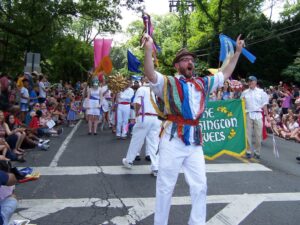 Danny Pushkin leading the Takoma Park parade Washington Revels group